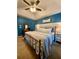 Spacious main bedroom featuring a trey ceiling, large bed, and dual nightstands at 305 Pleasant Forest Dr, Temple, GA 30179