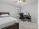 Comfortable bedroom with a ceiling fan, desk and a large window at 4643 Grand Central Pkwy, Decatur, GA 30035