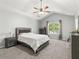 Bright bedroom with vaulted ceiling, ceiling fan, and ample natural light at 4643 Grand Central Pkwy, Decatur, GA 30035