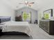 Spacious bedroom with vaulted ceiling, neutral tones and ample natural light at 4643 Grand Central Pkwy, Decatur, GA 30035