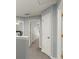 Hallway with neutral walls and carpeted flooring at 4643 Grand Central Pkwy, Decatur, GA 30035
