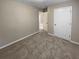 Spacious bedroom featuring neutral walls and carpet at 3510 Beaver Cove Rd, Cumming, GA 30041