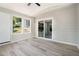 Bright sunroom with access to backyard through sliding glass door at 1703 Laurel Creek Cir, Lithonia, GA 30058