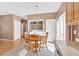 Cozy dining area features a wooden table set and is adjacent to the laundry area at 200 Arrowhead Ln, Canton, GA 30114