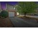 Well-maintained home with a two-car garage, neat landscaping, and inviting driveway at 200 Arrowhead Ln, Canton, GA 30114