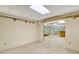 Open basement space featuring new carpet, neutral paint, and a sun room at 3200 Country Club Nw Ct, Kennesaw, GA 30144