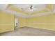 Large bedroom with trey ceiling and carpet at 3200 Country Club Nw Ct, Kennesaw, GA 30144