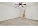Bedroom with ceiling fan, and an open doorway to a hallway at 3200 Country Club Nw Ct, Kennesaw, GA 30144