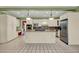Spacious kitchen with granite countertops, stainless steel appliances, and an island at 3200 Country Club Nw Ct, Kennesaw, GA 30144