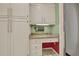 Bright kitchen featuring a granite topped desk area with drawers and tile flooring, for a great work space at 3200 Country Club Nw Ct, Kennesaw, GA 30144