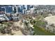 Aerial view of park featuring pond, mature trees, walking trails, and access to the city at 273 12Th Ne St # 114, Atlanta, GA 30309