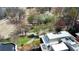 An aerial view shows a well-manicured green space with walking paths and lush, mature trees nearby upscale homes at 273 12Th Ne St # 114, Atlanta, GA 30309