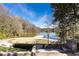 Scenic dock view featuring lush greenery, landscaped walkway, and park access at 273 12Th Ne St # 114, Atlanta, GA 30309