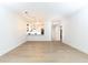 Spacious living room featuring sleek hardwood floors and an open-concept design with modern lighting at 273 12Th Ne St # 114, Atlanta, GA 30309