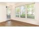 Bright living room with a modern ceiling fan and large windows bringing in lots of natural light at 273 12Th Ne St # 114, Atlanta, GA 30309