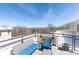 Rooftop deck offering seating and scenic treetop views on a sunny day at 273 12Th Ne St # 114, Atlanta, GA 30309
