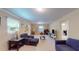 Finished basement area with bright paint and ample room for storage and recreation at 4172 Whispering Forest Ct, Lilburn, GA 30047