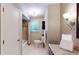 Well-lit bathroom with granite countertops, neutral tiling, and a shower-tub combo at 4172 Whispering Forest Ct, Lilburn, GA 30047