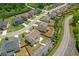 Aerial view of the neighborhood and home featuring mature trees at 1645 Dahlia Dr, Cumming, GA 30040