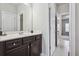 Well-lit bathroom showcasing a vanity with a white countertop and modern fixtures at 1645 Dahlia Dr, Cumming, GA 30040