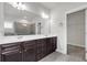Modern bathroom vanity with double sinks and large mirror at 1645 Dahlia Dr, Cumming, GA 30040