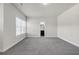 Bedroom has neutral walls, carpet flooring, bright white trim, and view to the bath at 1645 Dahlia Dr, Cumming, GA 30040