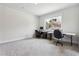 Bright home office setup, perfect for work or study with ample space and natural light at 1645 Dahlia Dr, Cumming, GA 30040