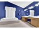 Primary bath with soaking tub, dual vanities, and ample counter space at 200 Boca Ciega Ct, Alpharetta, GA 30022