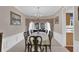 Elegant dining room featuring a large bay window and classic decor at 200 Boca Ciega Ct, Alpharetta, GA 30022