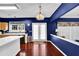Bright kitchen with hardwood floors and access to the back door at 200 Boca Ciega Ct, Alpharetta, GA 30022