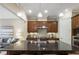 Well-equipped kitchen with granite countertops, stylish cabinets, and modern appliances at 25 High Gate Trail, Atlanta, GA 30030