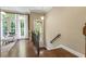 Bright landing space with large windows, hardwood floors and an adjacent sitting area at 25 High Gate Trail, Atlanta, GA 30030