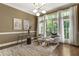 Cozy sitting area with floor-to-ceiling windows and comfortable seating at 25 High Gate Trail, Atlanta, GA 30030