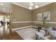 Inviting sitting room with hardwood floors, neutral rug, and modern decor at 25 High Gate Trail, Atlanta, GA 30030