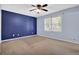 Carpeted bedroom with natural light coming through a large window at 3090 Thrasher Nw Ct, Kennesaw, GA 30144