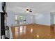 Expansive living room with a fireplace, hardwood floors, and plenty of space for entertaining at 3090 Thrasher Nw Ct, Kennesaw, GA 30144