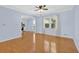 Bright living room featuring hardwood floors, large windows, and ample natural light at 3090 Thrasher Nw Ct, Kennesaw, GA 30144