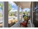 Relaxing front porch with comfortable seating, offering a pleasant view of the neighborhood street at 460 Marston Pass, Acworth, GA 30102