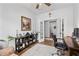 An office featuring hardwood floors, white trim, double doors, and stylish accents at 460 Marston Pass, Acworth, GA 30102