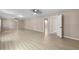 Spacious basement area featuring durable floors and ample room for activities at 191 Orchard Dr, Canton, GA 30115