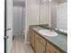 Well-lit bathroom with a large vanity and shower/tub combo at 191 Orchard Dr, Canton, GA 30115