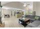 Open concept living space featuring modern kitchen, vaulted ceilings, and comfortable seating at 191 Orchard Dr, Canton, GA 30115