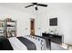 Comfortable bedroom with sleek black furnishings, great natural light, and modern ceiling fan at 2086 Harold Se Ave, Smyrna, GA 30080