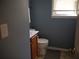 Cozy bathroom with a vanity and toilet at 4909 Farm Valley Ne Dr, Woodstock, GA 30188
