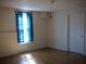 This bright bedroom features a window with wood floors at 4909 Farm Valley Ne Dr, Woodstock, GA 30188