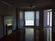 Spacious living room with fireplace and large windows for natural light at 4909 Farm Valley Ne Dr, Woodstock, GA 30188