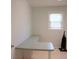 An office with a window and a large U shaped desk at 4909 Farm Valley Ne Dr, Woodstock, GA 30188