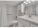 Bathroom featuring a shower, bathtub, white tiled walls, and vanity sink at 115 Braided Blanket Blf, Johns Creek, GA 30022