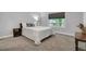 Comfortable bedroom with plush carpet, a window with exterior view, and neutral tones perfect for relaxation at 115 Braided Blanket Blf, Johns Creek, GA 30022
