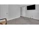 Bright bedroom featuring neutral colored walls and plush carpet at 115 Braided Blanket Blf, Johns Creek, GA 30022
